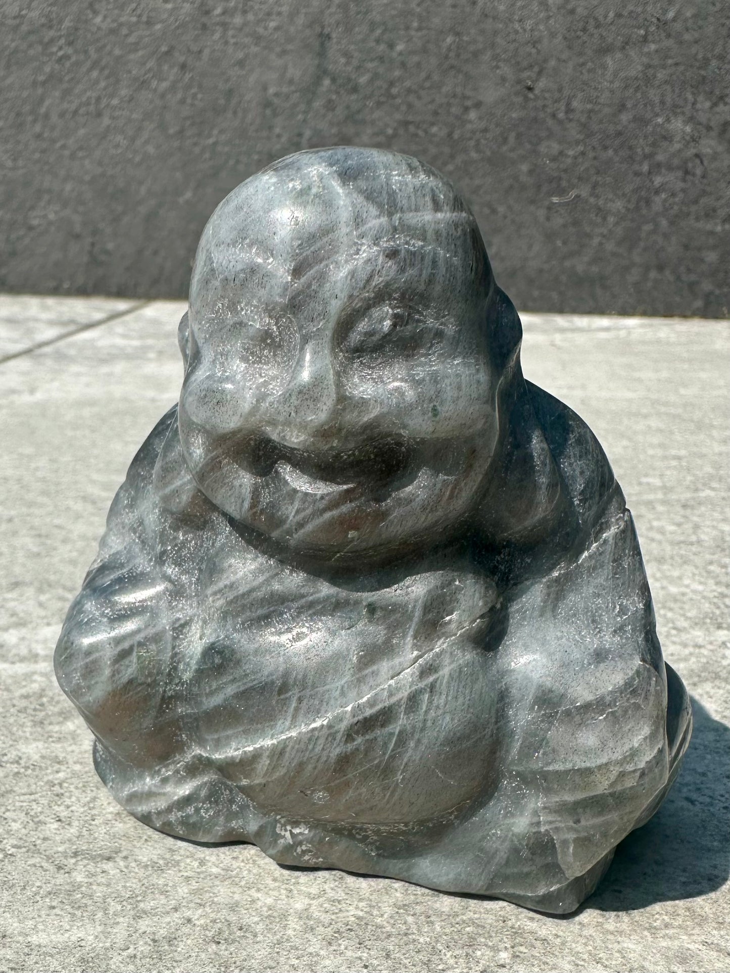 Lab Orange Buddha Carving