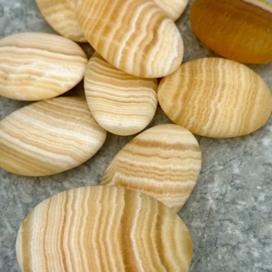 Orange Calcite Palm Stone