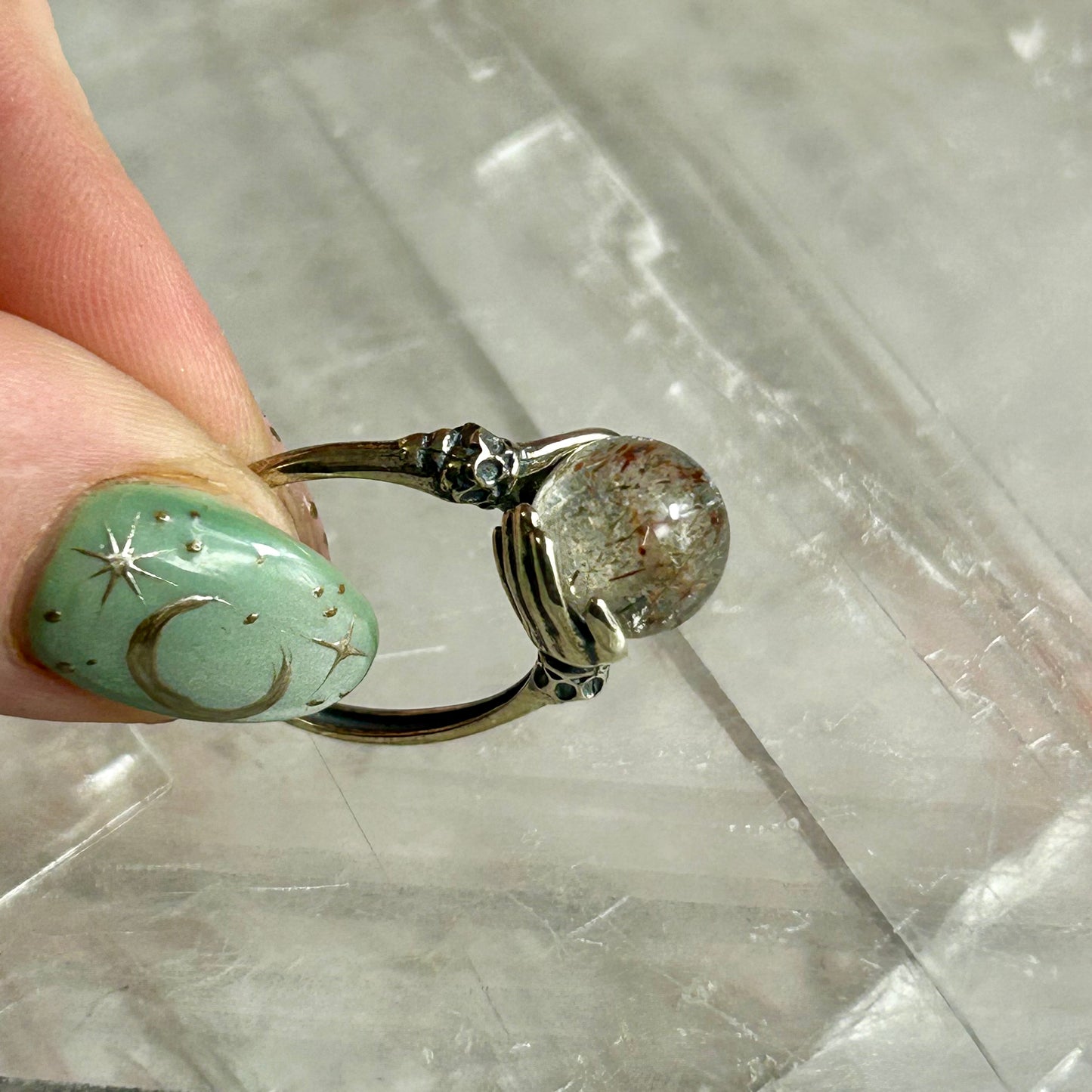 925 Silver Adjustable Hand's Holding Sphere Ring