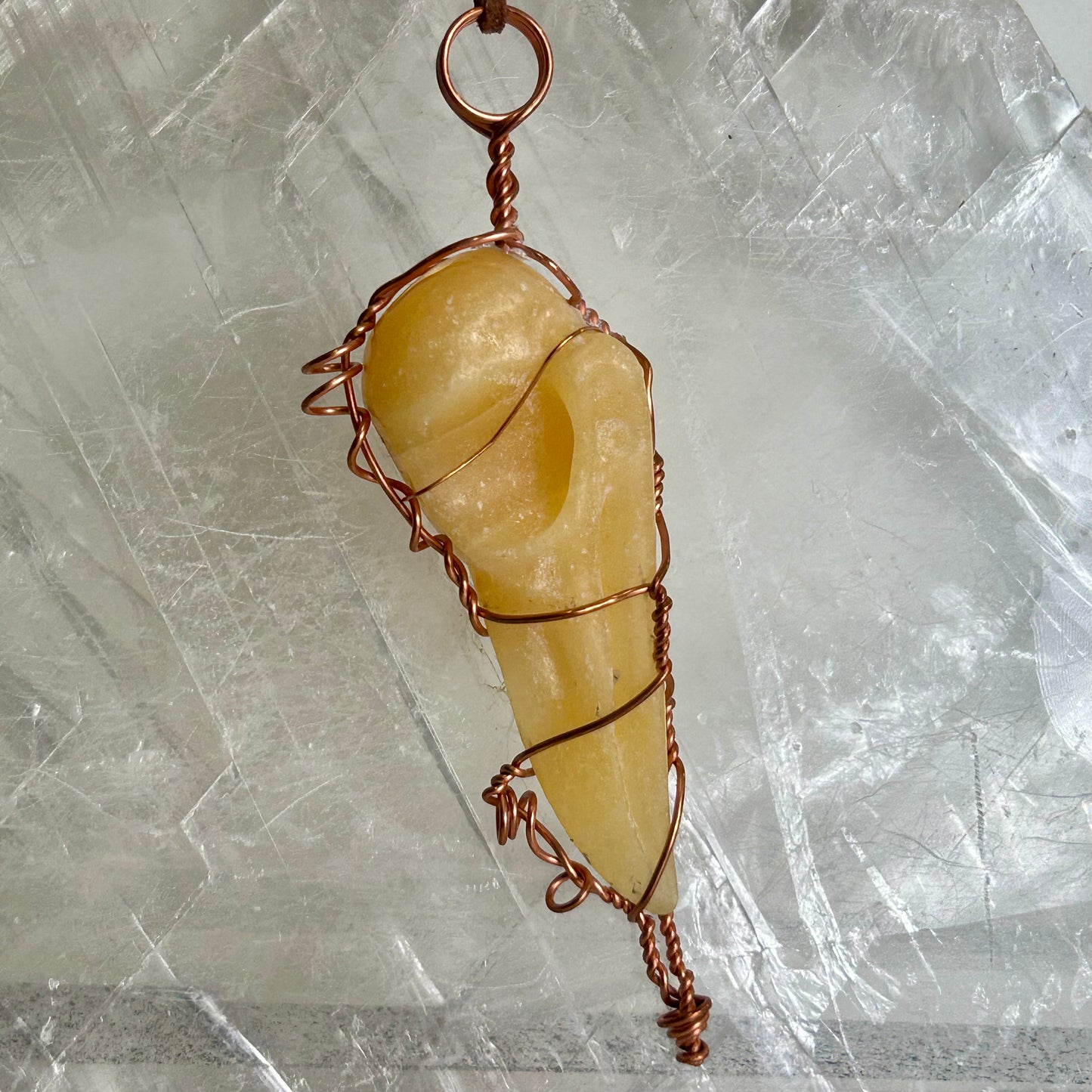 Lee's Makes - Orange Calcite Raven Head Pendant